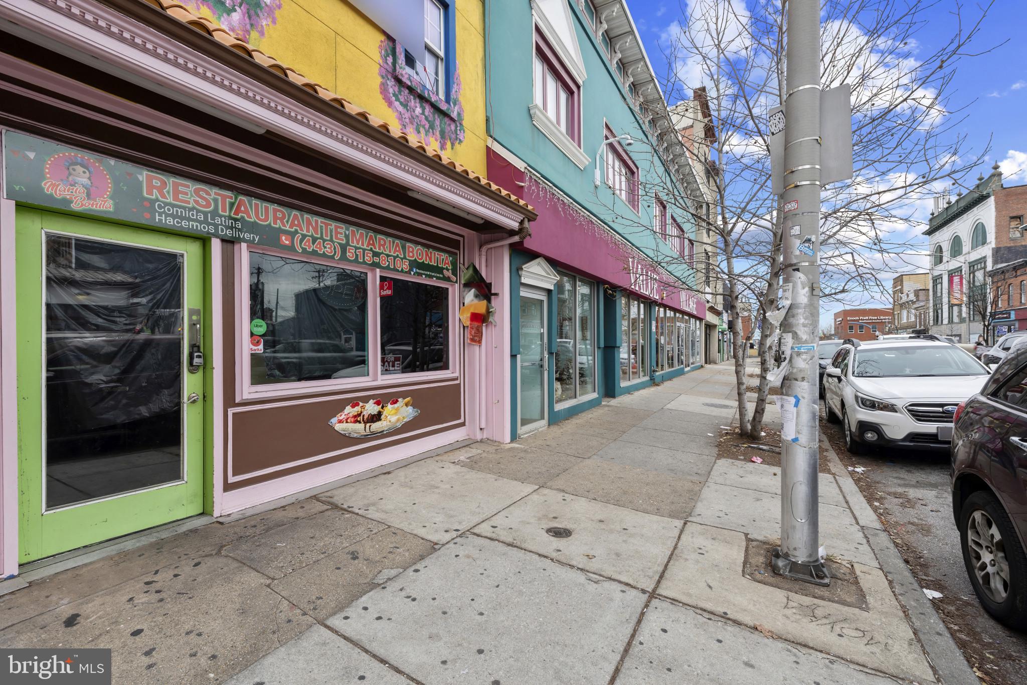 3418 Eastern Avenue Baltimore, MD 21224 - Photo 3 of 53 a view of a building with car parked