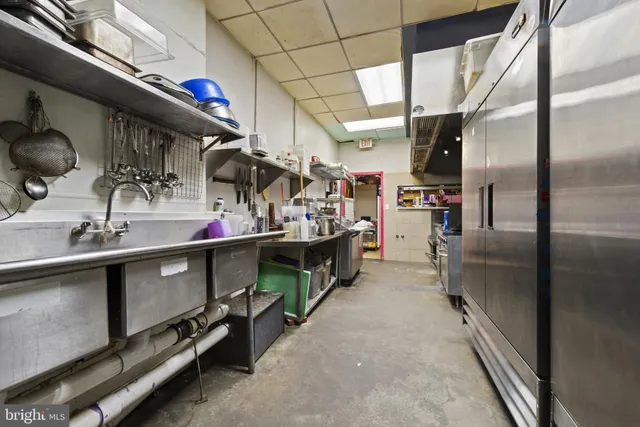 a view of a kitchen cabinets and wooden floor