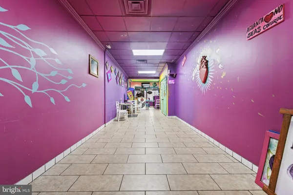 a view of a storage & utility room with wooden floor