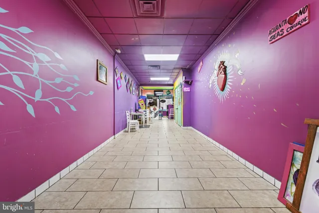 a view of a storage & utility room with wooden floor