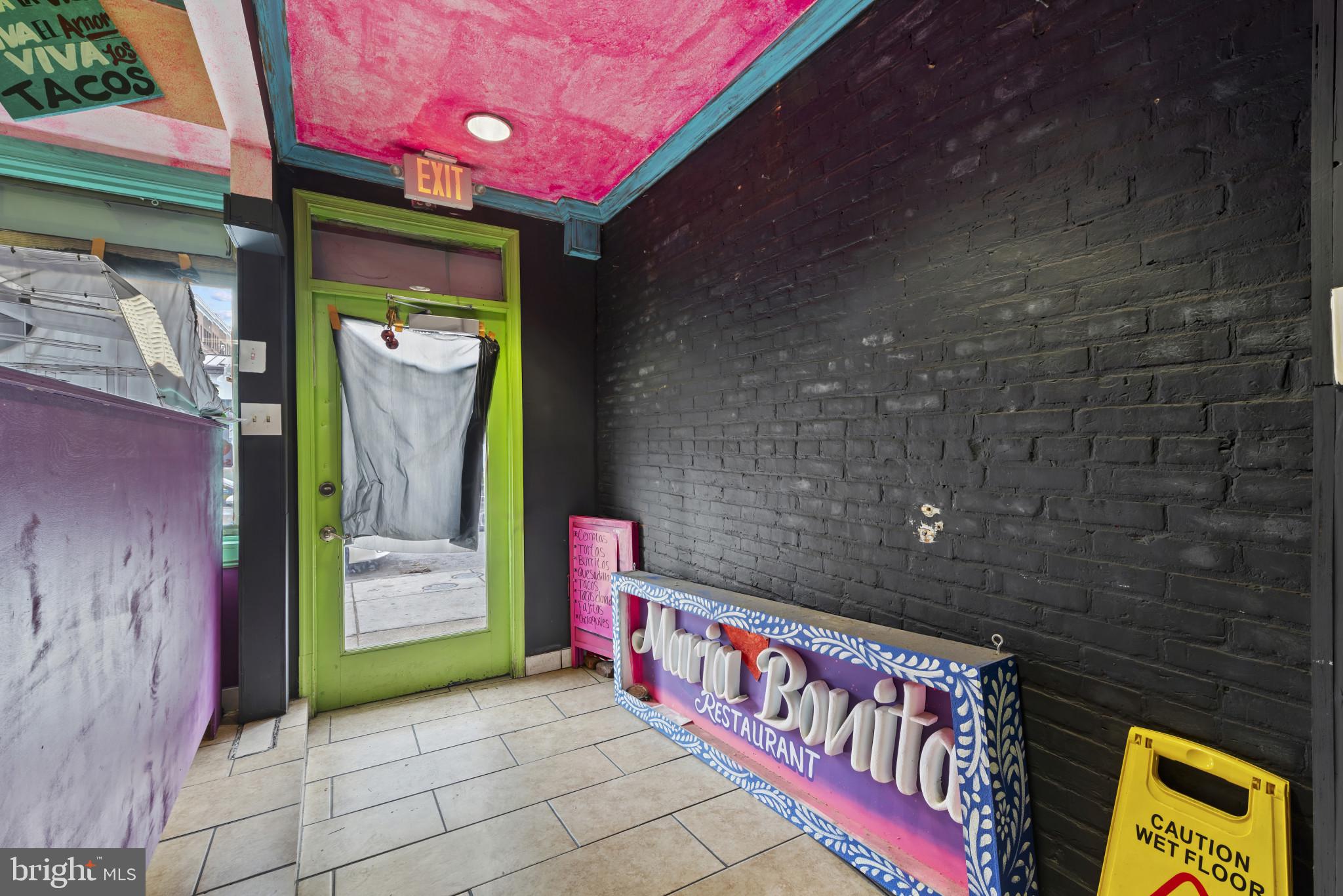 3418 Eastern Avenue Baltimore, MD 21224 - Photo 4 of 53 a front view of a house with shower