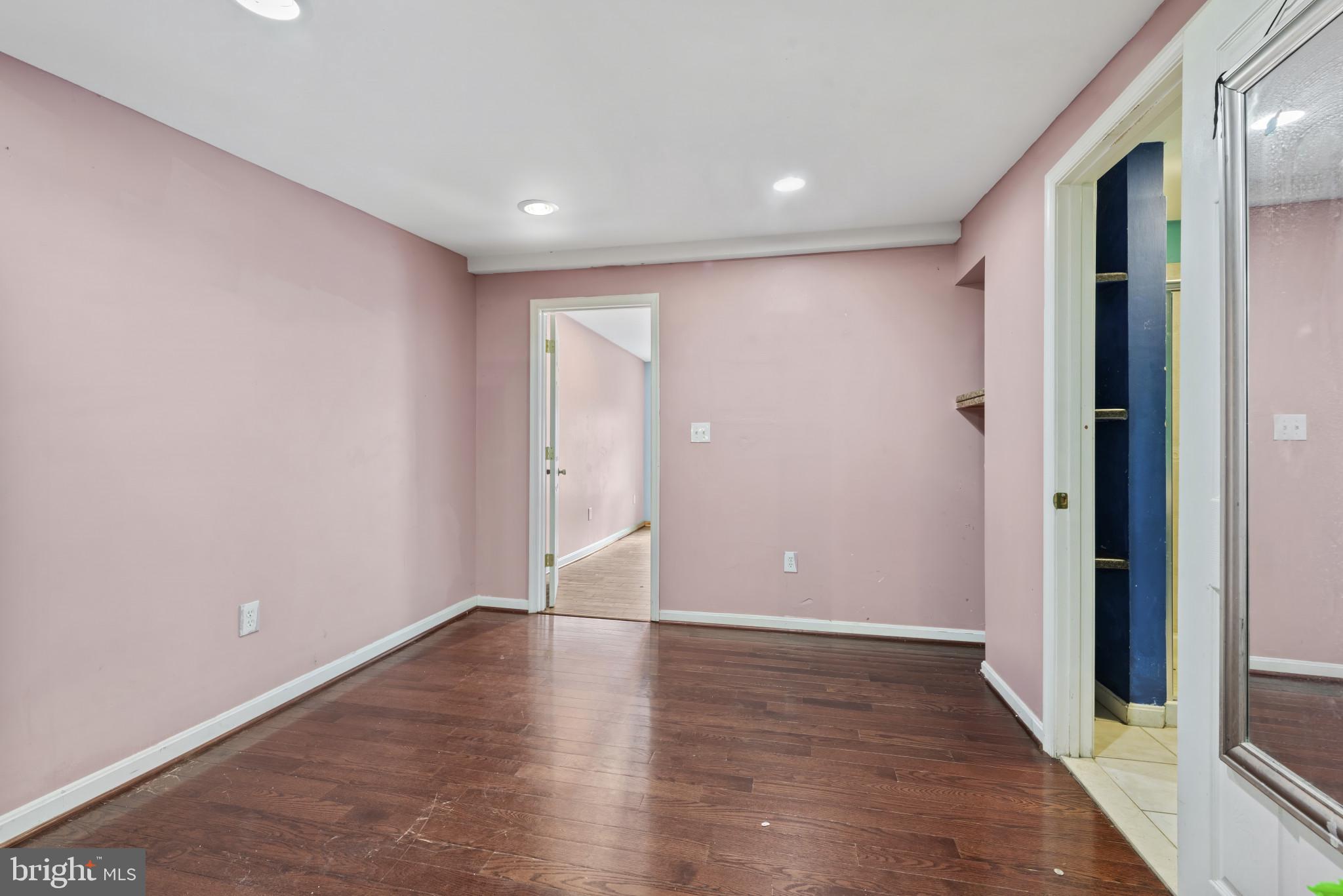3418 Eastern Avenue Baltimore, MD 21224 - Photo 41 of 53 a view of an empty room with wooden floor