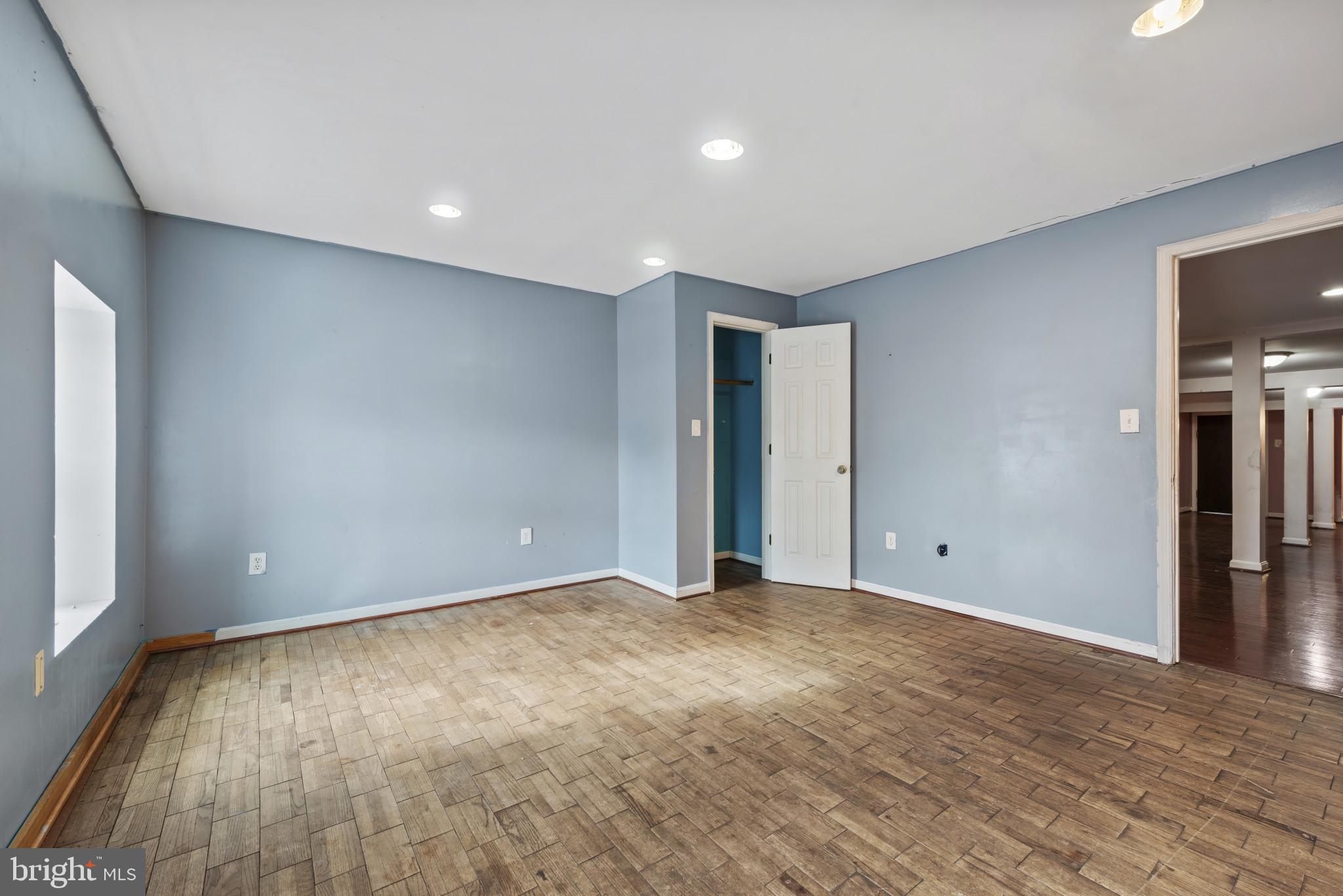 3418 Eastern Avenue Baltimore, MD 21224 - Photo 47 of 53 a view of an empty room with wooden floor