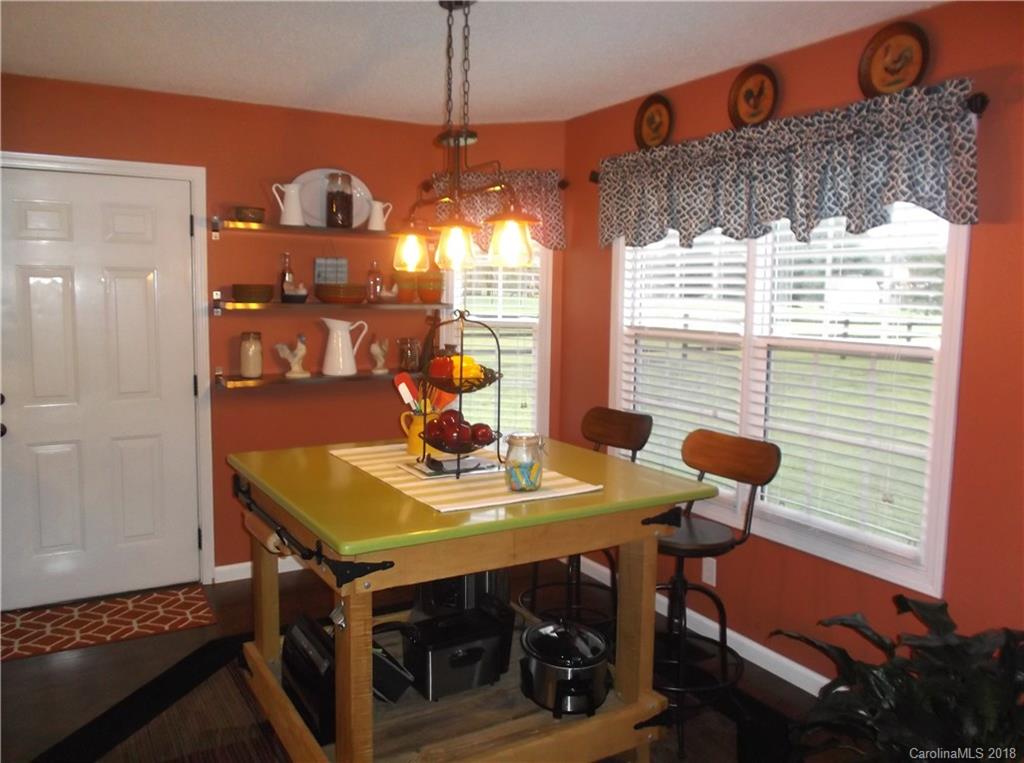 136 Maple Ridge Circle Salisbury, NC 28147 - Photo 2 of 23 a view of a dining room with furniture and window