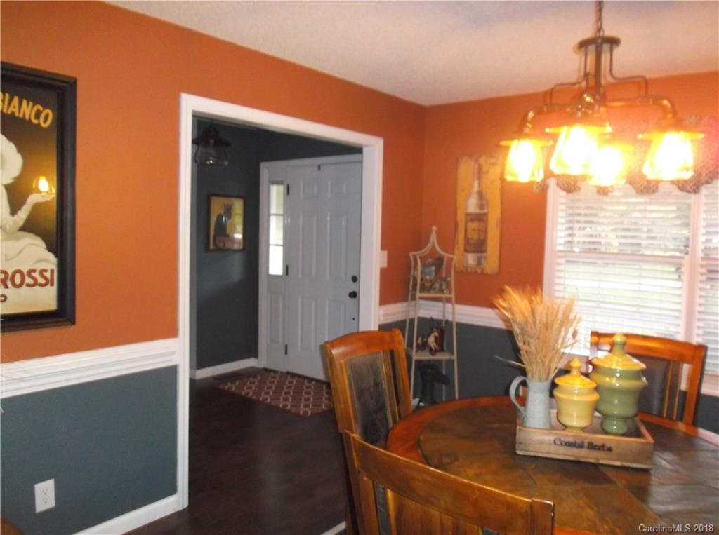136 Maple Ridge Circle Salisbury, NC 28147 - Photo 12 of 23 a view of a dining room with furniture window and outside view