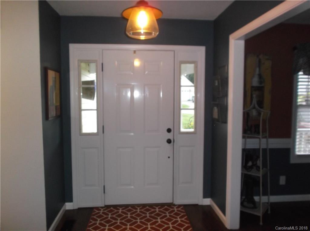 136 Maple Ridge Circle Salisbury, NC 28147 - Photo 9 of 23 a bathroom with a light fixture and a mirror