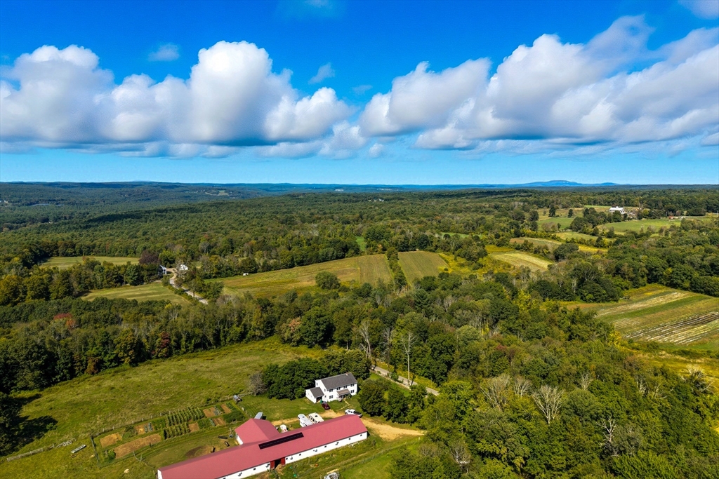 716 Hardwick Road New Braintree, MA 01531 - Photo 1 of 15 a view of an city and mountain