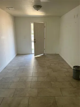 a view of a storage & utility room with a washer dryer