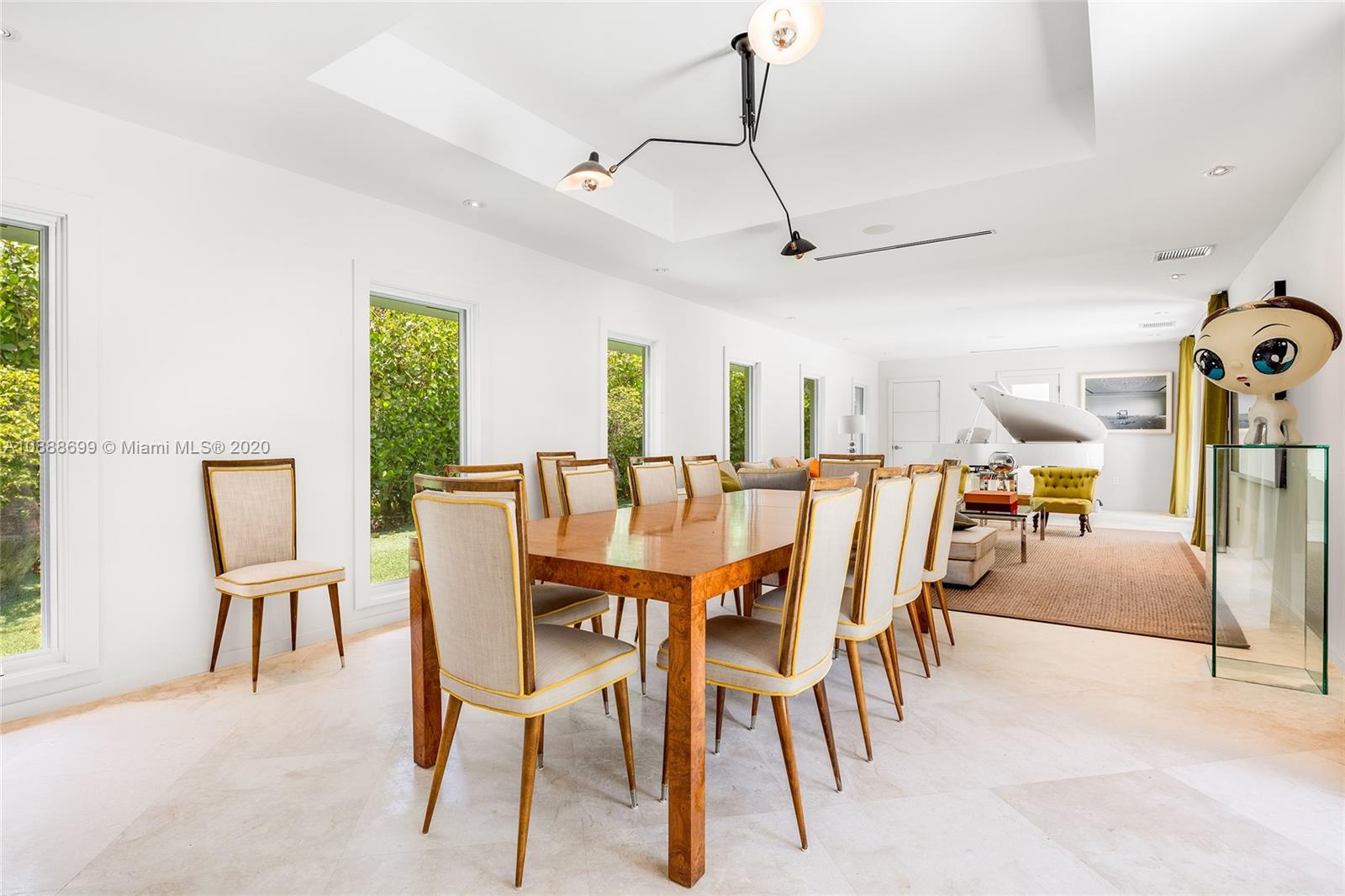 621 Island Road Miami, FL 33137 - Photo 13 of 39 a dining room with furniture and window
