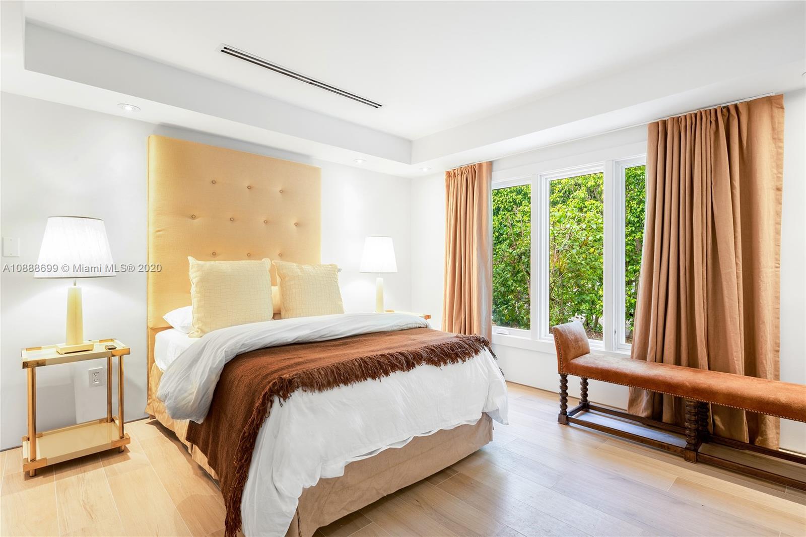 621 Island Road Miami, FL 33137 - Photo 23 of 39 a bedroom with a bed and a window