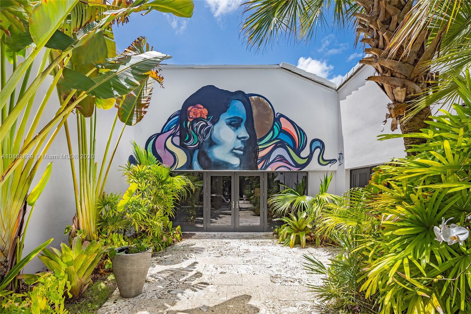 621 Island Road Miami, FL 33137 - Photo 29 of 39 a sign that is on the wall of a building