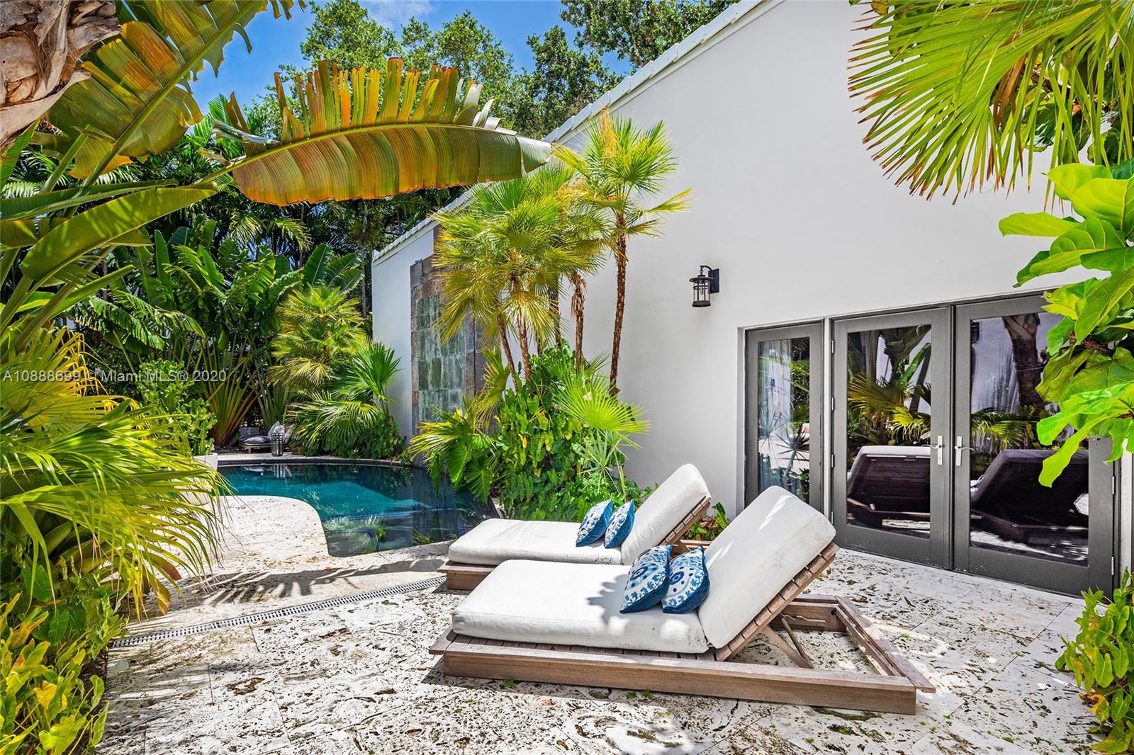 621 Island Road Miami, FL 33137 - Photo 30 of 39 a view of a chair and table in the patio