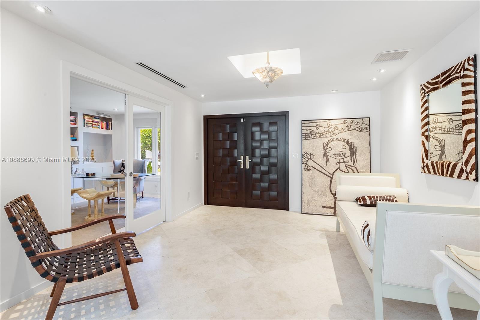 621 Island Road Miami, FL 33137 - Photo 3 of 39 a bedroom with furniture and a window