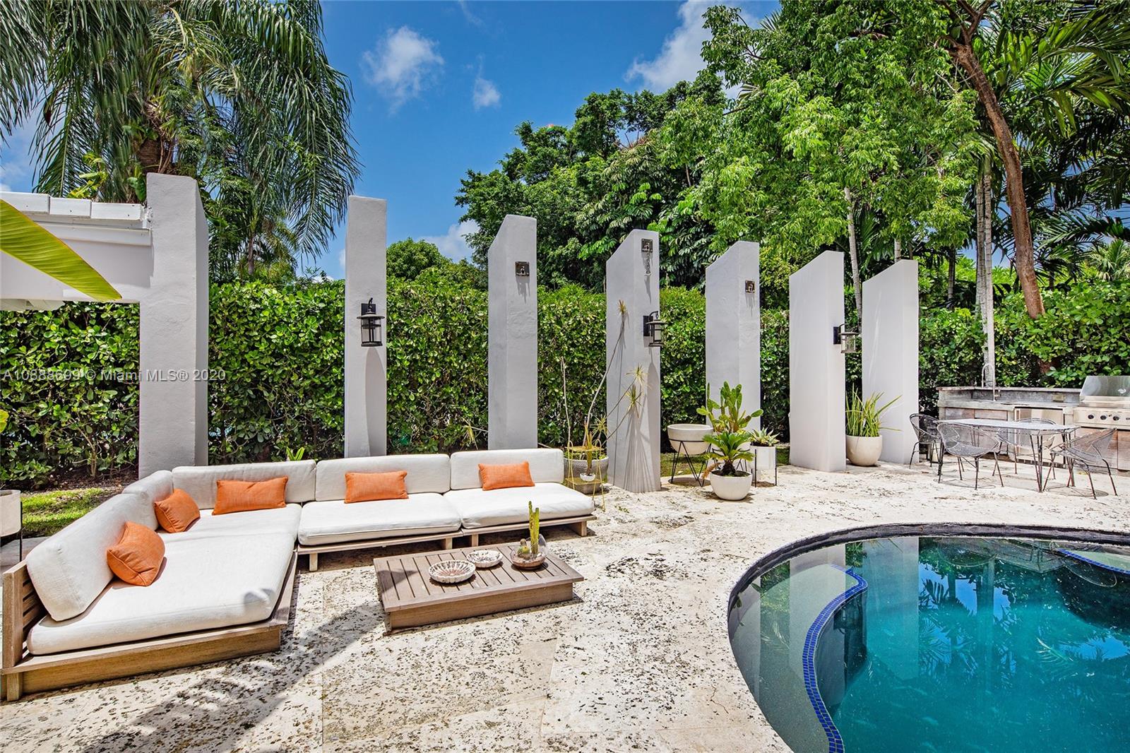 621 Island Road Miami, FL 33137 - Photo 32 of 39 a outdoor living space with furniture and garden view