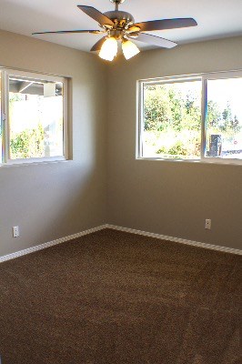 18-7857 Kaniela Road Mountain View, HI 96771 - Photo 15 of 24 a view of an empty room with a window