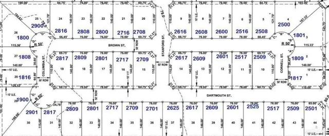 a black and white photo of a white building