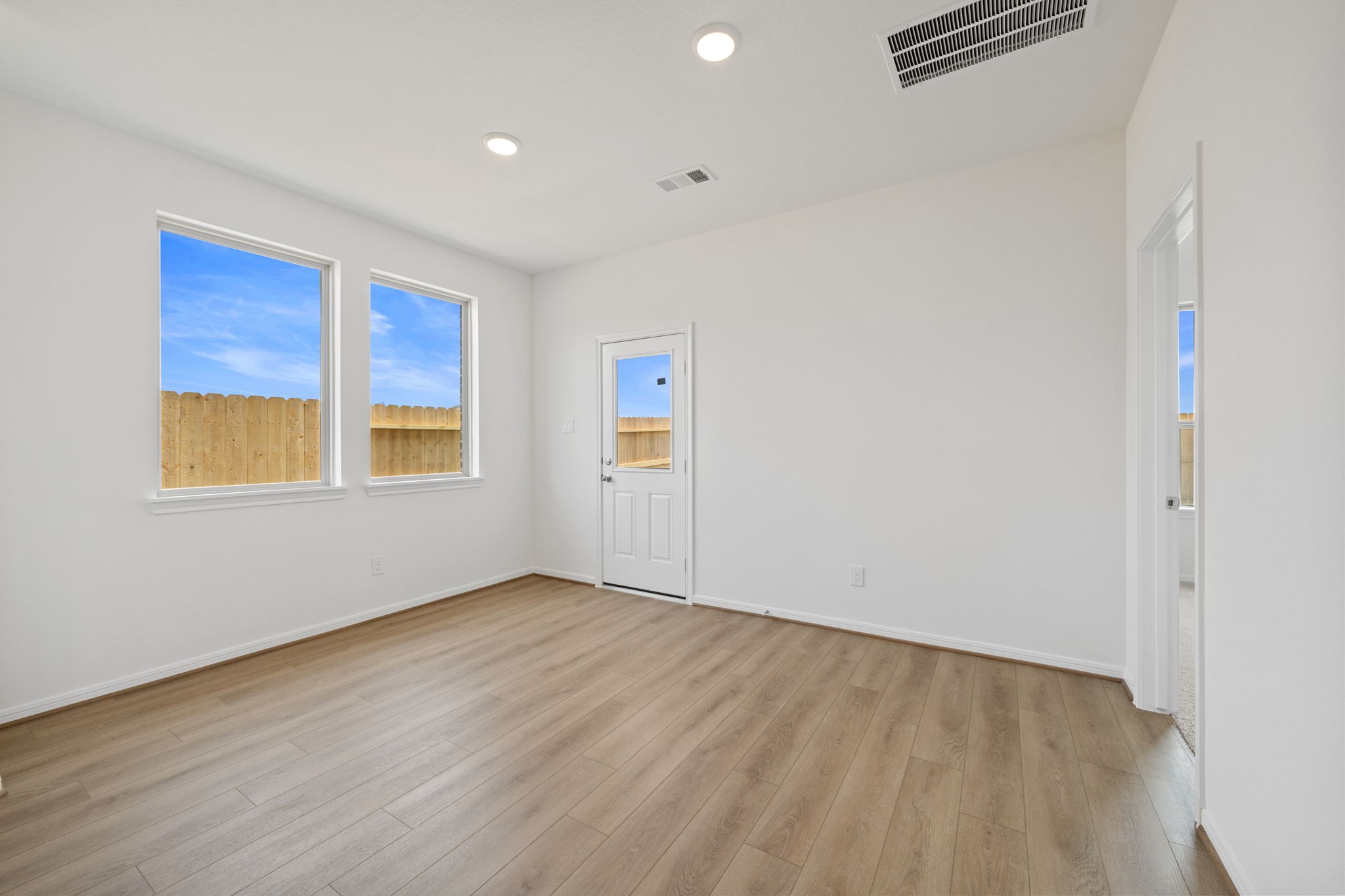 23623 Cinnamon Tree Lane Katy, TX 77493 - Photo 9 of 31 an empty room with windows