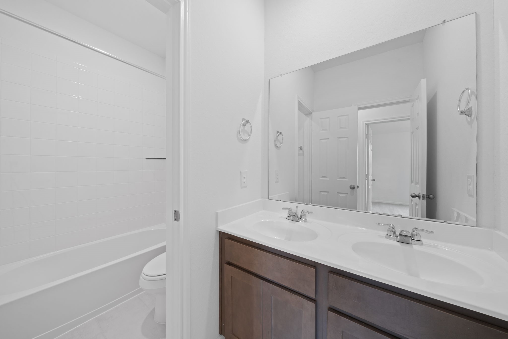 23623 Cinnamon Tree Lane Katy, TX 77493 - Photo 15 of 31 a bathroom with a sink and a mirror