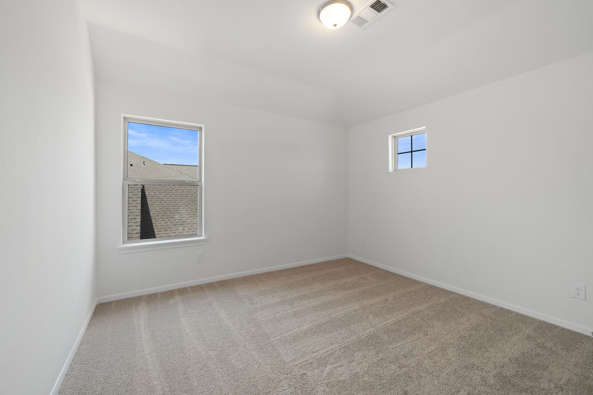 23623 Cinnamon Tree Lane Katy, TX 77493 - Photo 16 of 31 an empty room with a window