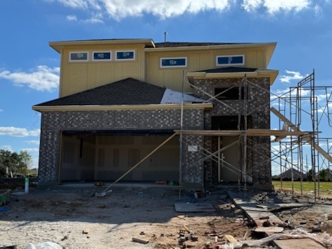 23623 Cinnamon Tree Lane Katy, TX 77493 - Photo 2 of 31 a front view of a house with a yard