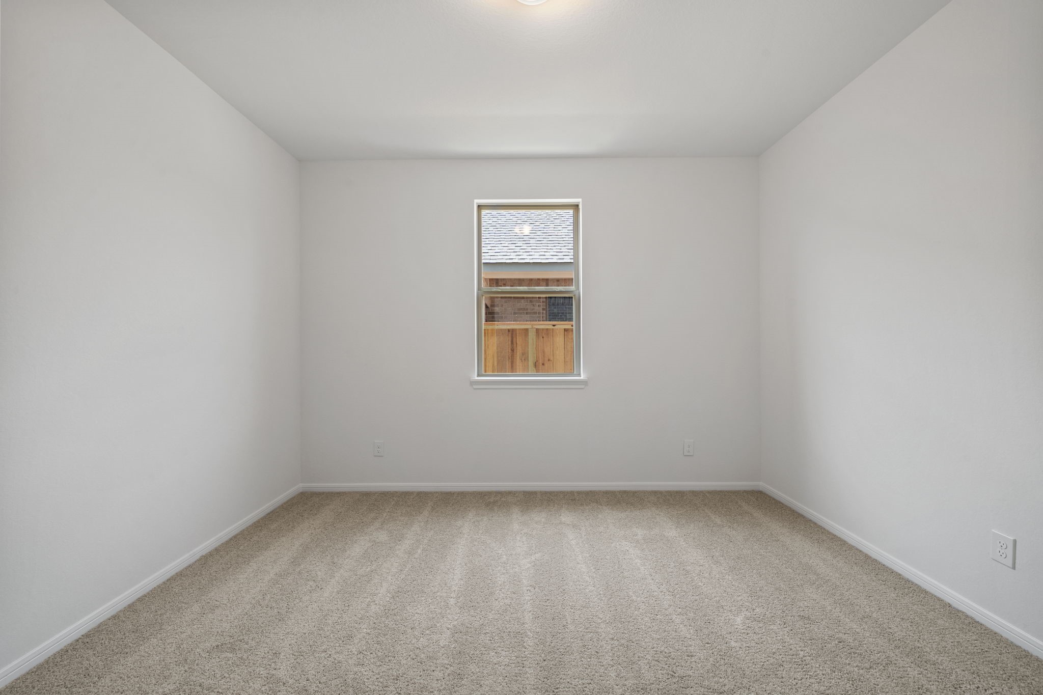 23623 Cinnamon Tree Lane Katy, TX 77493 - Photo 4 of 31 an empty room with a window