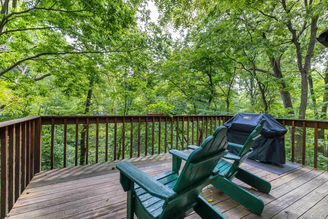 a view of a two chairs in the deck