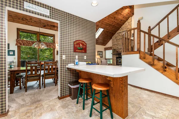 a dinning table and chairs in the patio