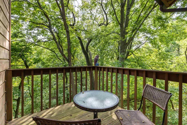 a view of a balcony with a swing