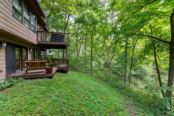 a view of a chair and table of the house
