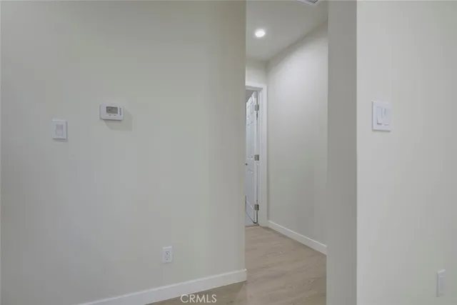 a view of hallway with shower
