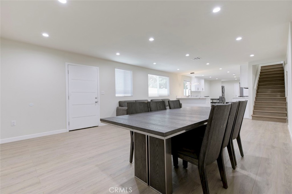 7711 Forsyth Street Tujunga, CA 91042 - Photo 2 of 35 a kitchen with a table and chairs in it