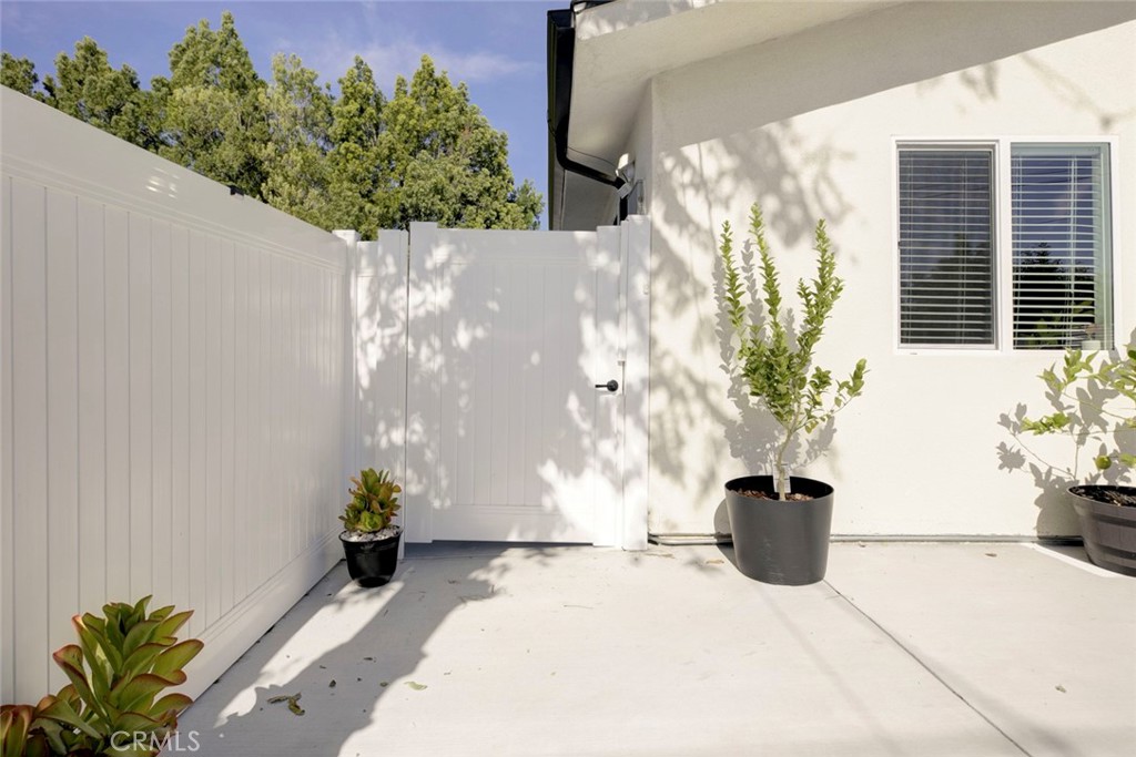 7711 Forsyth Street Tujunga, CA 91042 - Photo 33 of 35 a white vase with flowers on a table