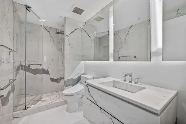 a view of a city with tall buildings