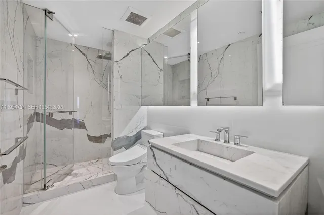 a view of a city with tall buildings