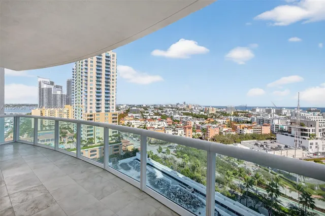 a view of a lake with a city