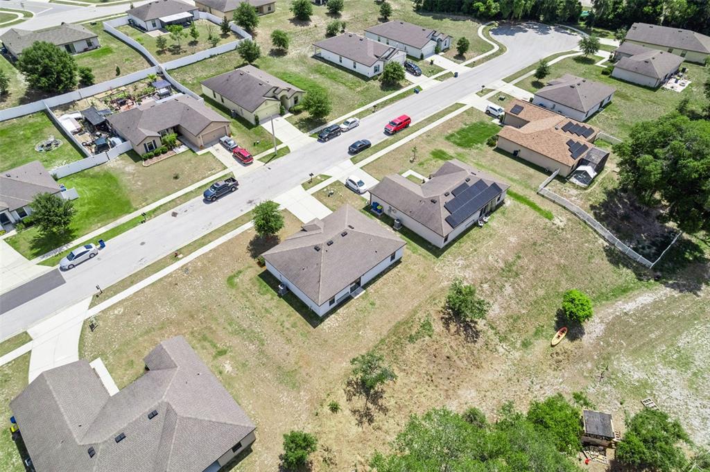 1613 Orne Street Mascotte, FL 34753 - Photo 30 of 31 an aerial view of residential houses with outdoor space