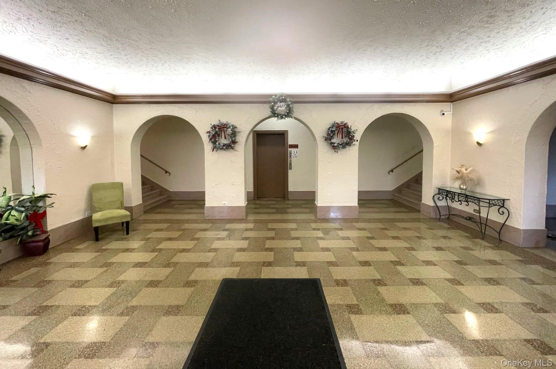 475 Bronx River Road, Unit 3G Yonkers, NY 10704 - Photo 2 of 21 a view of entryway and hall with a mirror