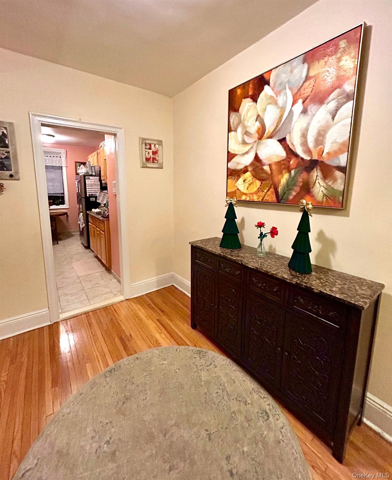 475 Bronx River Road, Unit 3G Yonkers, NY 10704 - Photo 4 of 21 a bedroom with a bed and wooden floor