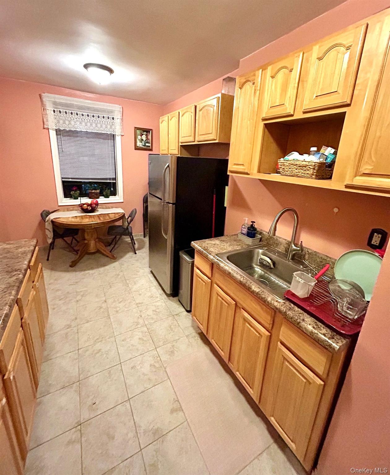 475 Bronx River Road, Unit 3G Yonkers, NY 10704 - Photo 6 of 21 a bedroom with a bed and cabinets