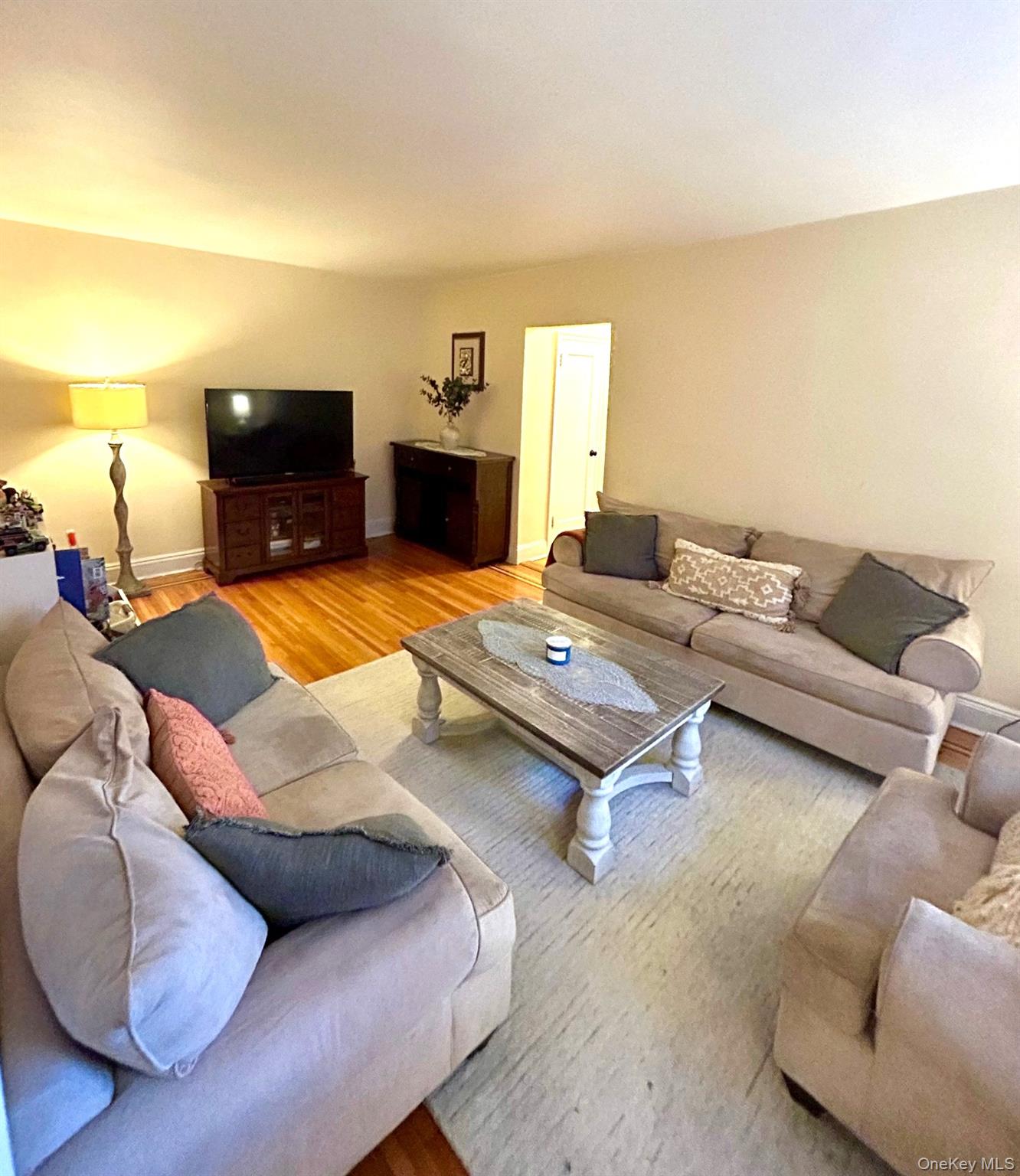 475 Bronx River Road, Unit 3G Yonkers, NY 10704 - Photo 9 of 21 a living room with furniture and a fireplace