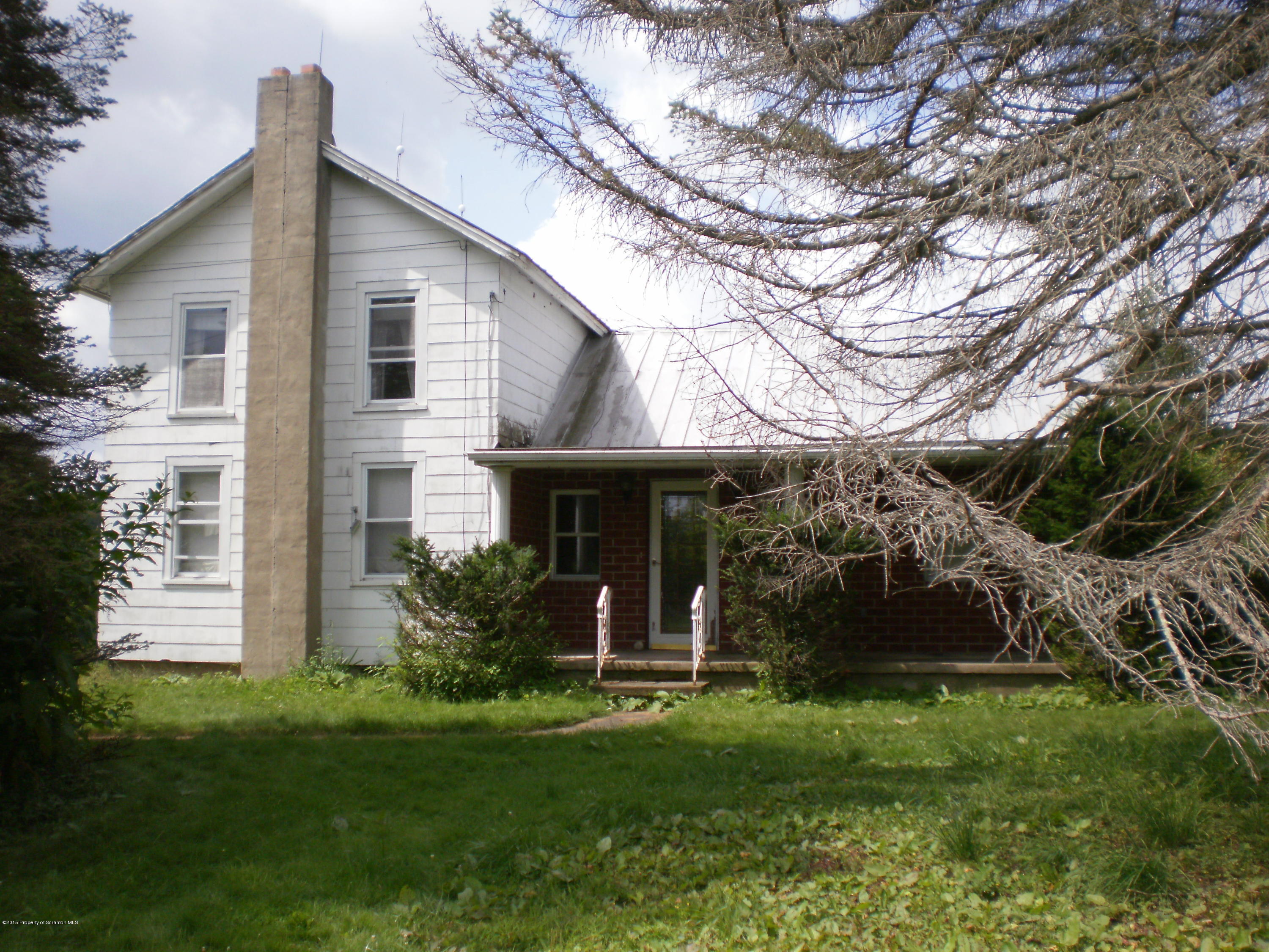 3026 West Nicholson Road Nicholson, PA 18446 - Photo 1 of 22 a view of a house with a yard