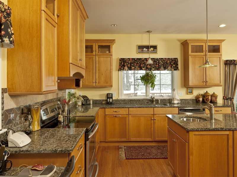 100 Shepard's Cove Road, Unit K2 Kittery, ME 03904 - Photo 4 of 24 Kitchen. Bright windows line the...