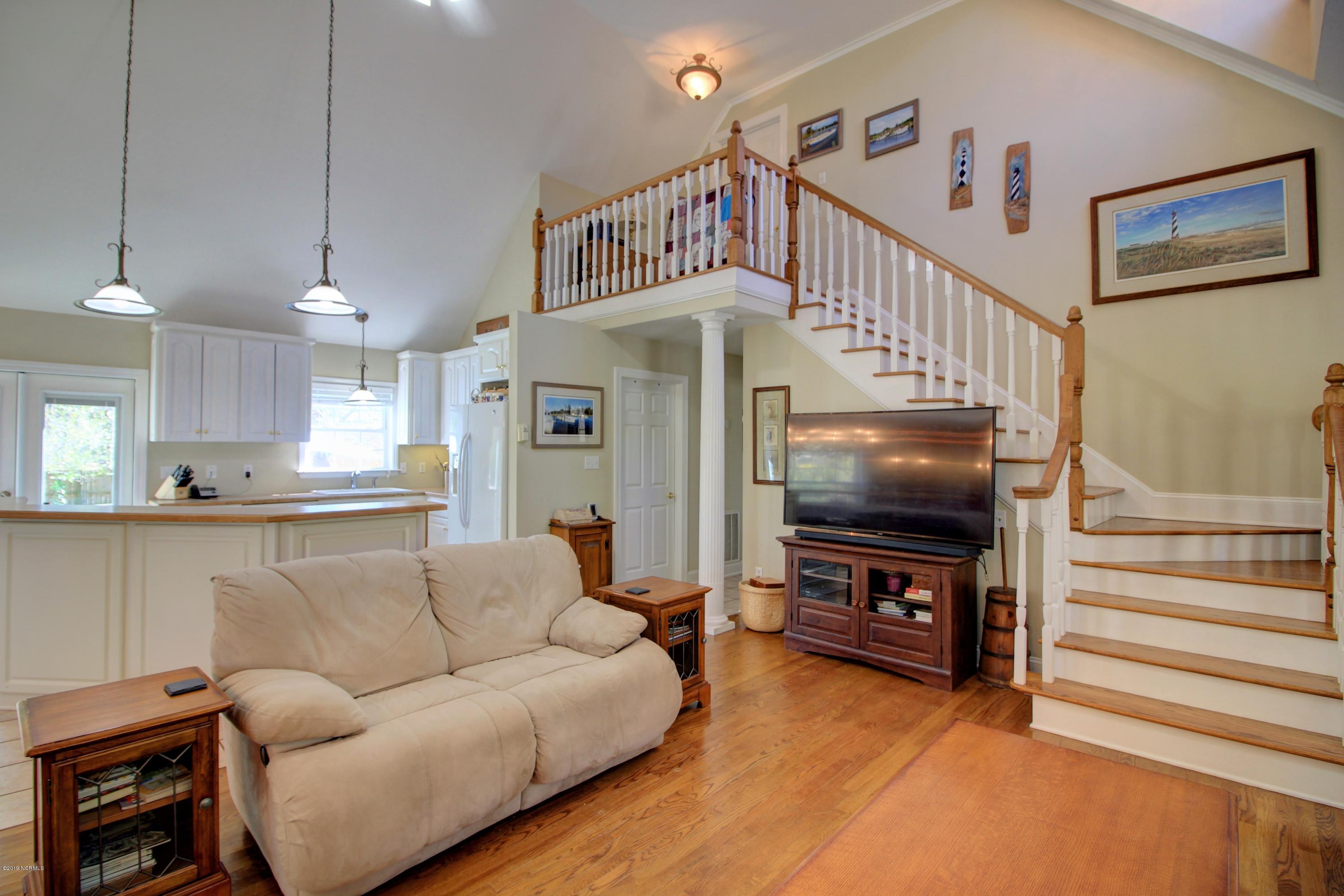 1095 Roberts Road Newport, NC 28570 - Photo 9 of 35 Plenty of windows, high ceilings and hardwood floors.