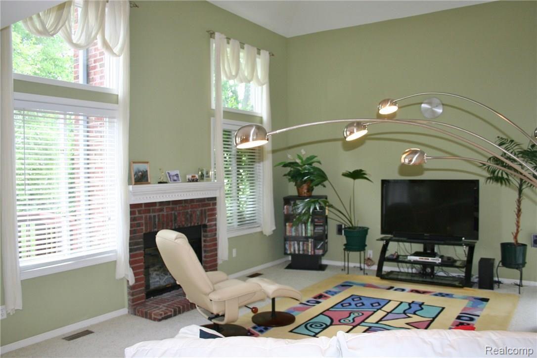 45262 Lothrop Road Canton, MI 48188 - Photo 22 of 50 Family room with fireplace!