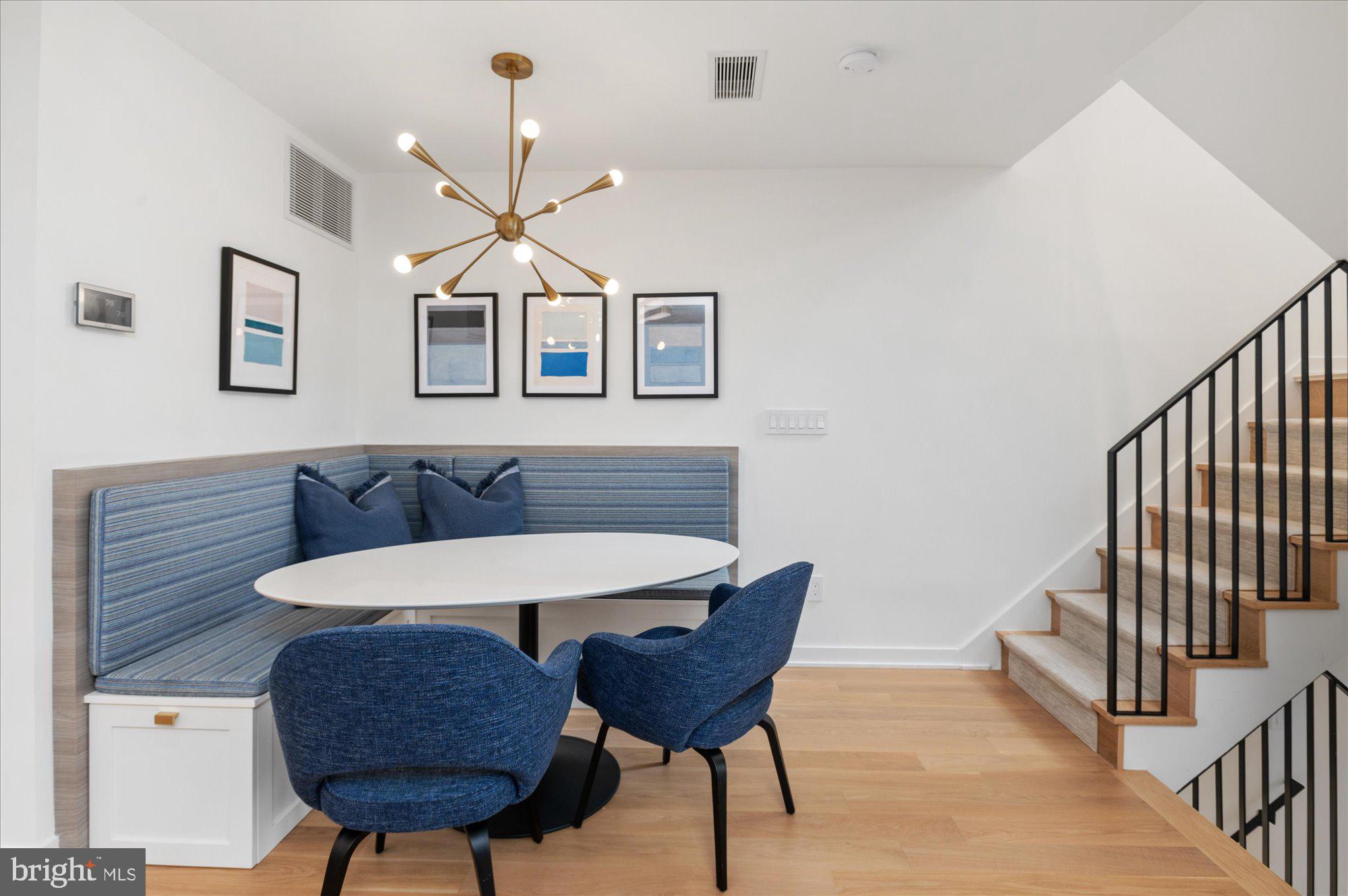 7313 Woodmont Avenue, Unit R Bethesda, MD 20814 - Photo 12 of 29 a view of a room with furniture and wooden floor