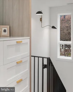 a bathroom with a bathtub and a window