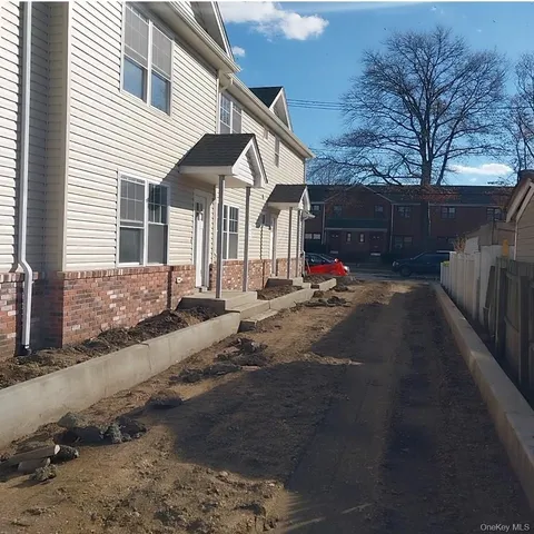 a front view of house with yard