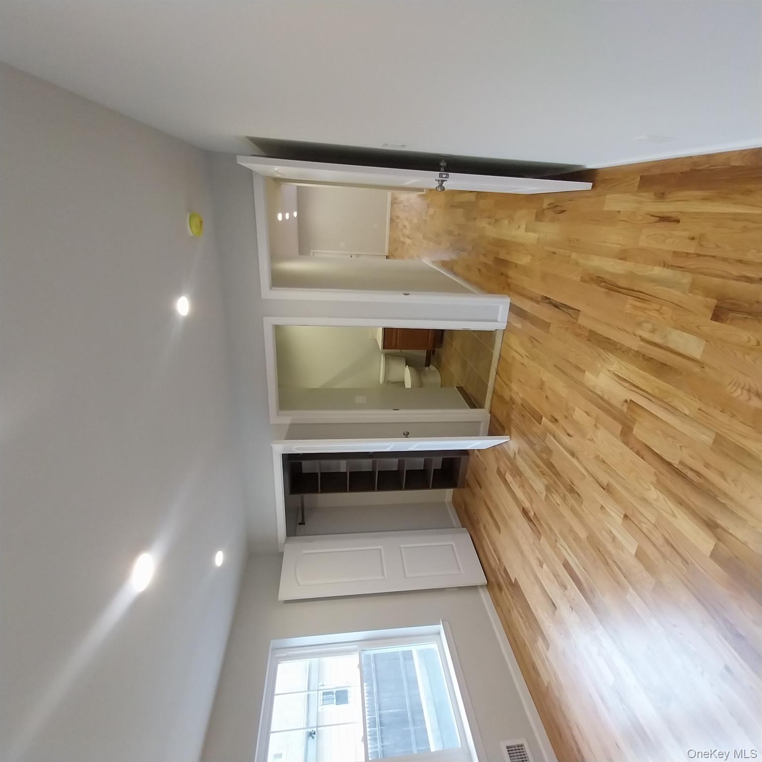 343 Jackson Street, Unit 1 Hempstead, NY 11550 - Photo 14 of 31 a view of livingroom with natural light