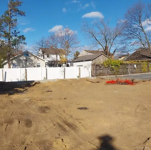 a view of a backyard of a house