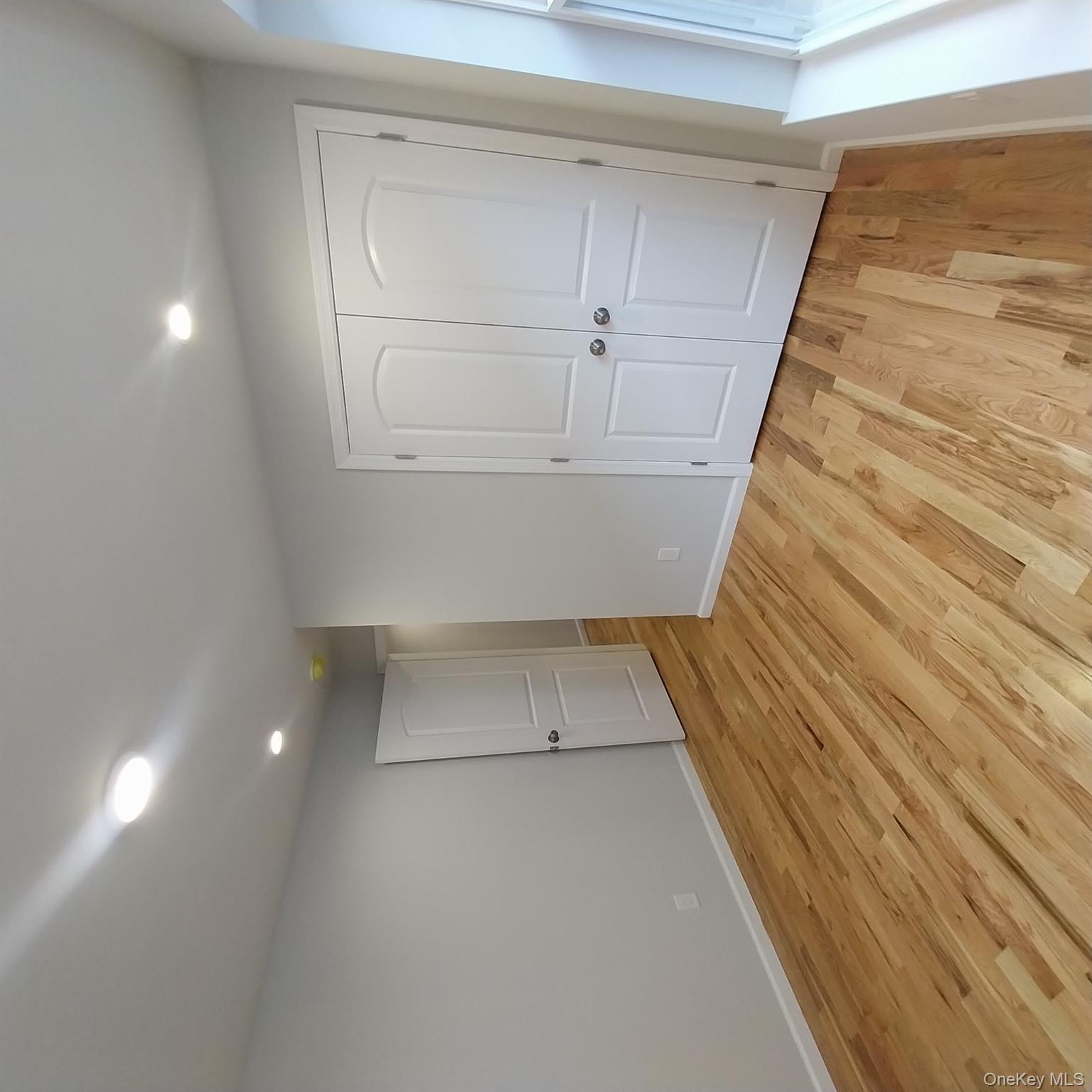 343 Jackson Street, Unit 1 Hempstead, NY 11550 - Photo 20 of 31 a view of an empty room